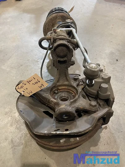 toyota-yaris-2-p9-10-links-voor-veerpoot-remklauw-compleet — foto 7