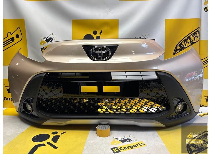 Toyota Aygo X Voorbumper origineel 52119-OH19 pdc compleet