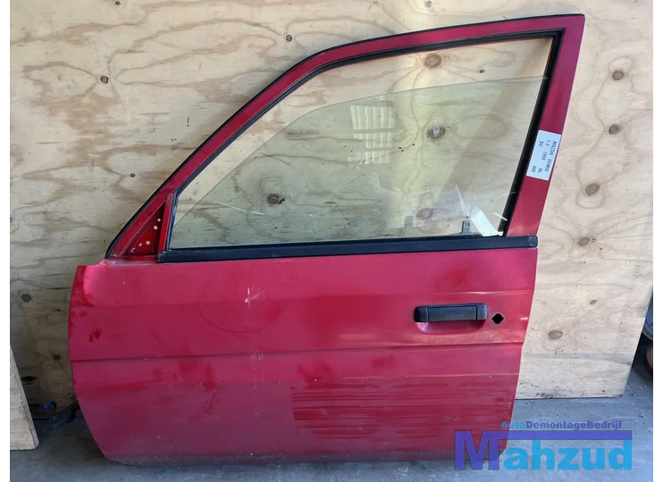 MAZDA DEMIO ROOD SU links voor deur portier 1996-2003
