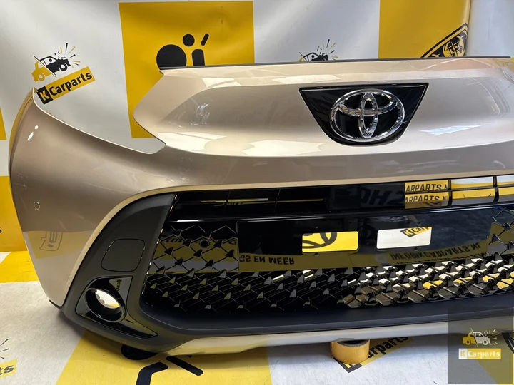 toyota-aygo-x-voorbumper-origineel-compleet-nieuw-pdc — foto 11