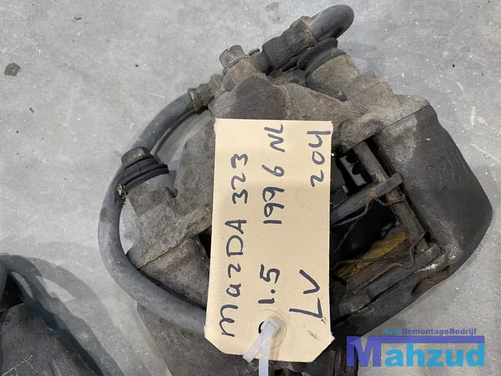 mazda-323-f-5-remtang-remklauw-links-rechts-voor-1994-1998 — foto 2