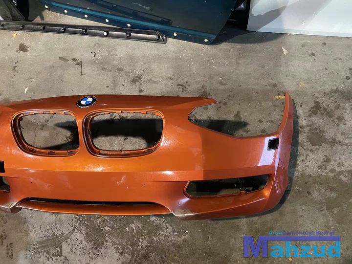 bmw-f20-f21-oranje-b44-voorbumper-koplamp-sproeiers — foto 2