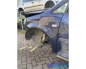 2012-vw-caddy-3-demontage-onderdelen-deur-blauw-stoelen — foto 3
