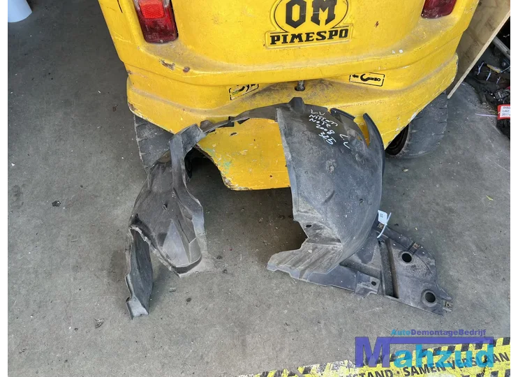 NISSAN NOTE links voor modderkuip wielkuip 2005-2012