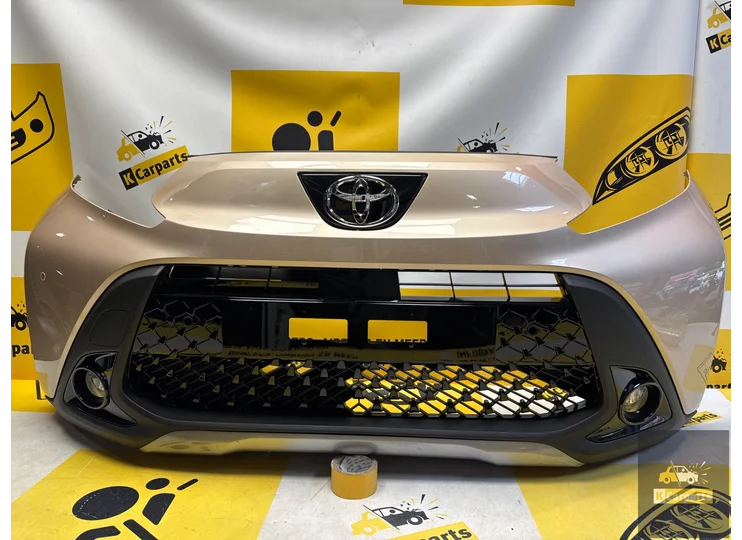 Toyota Aygo X Voorbumper origineel 52119-OH19 pdc compleet