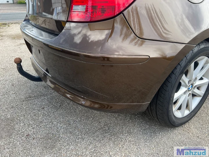 bmw-1-serie-e87-bruin-b098-achterbumper-20042011 — foto 3