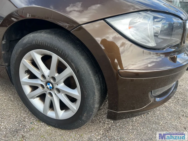 bmw-1-serie-e87-bruin-b098-voorbumper-20042011 — foto 5
