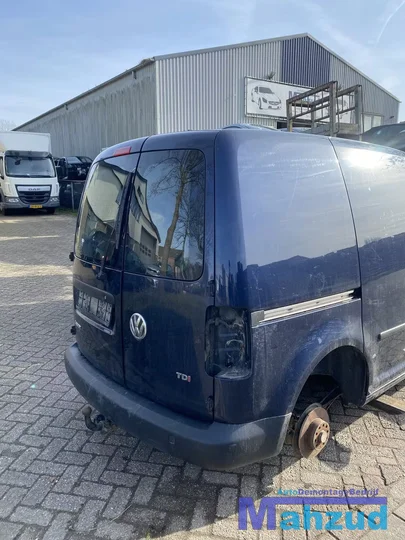 2012-vw-caddy-3-demontage-onderdelen-deur-blauw-stoelen — foto 6