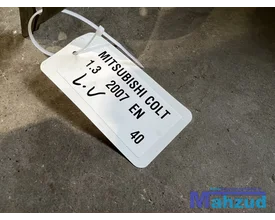 mitsubishi-colt-6-links-voor-modderkuip-20022012 — foto 3