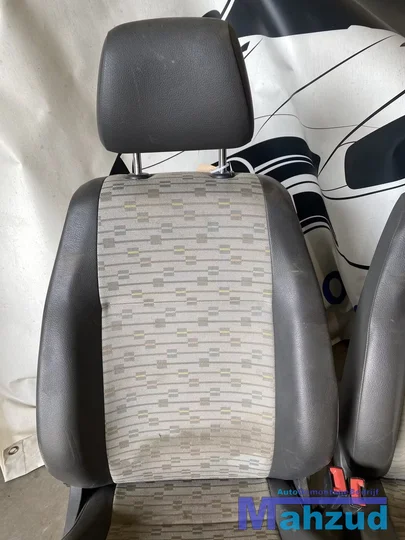 2012-vw-caddy-3-bestuurders-stoel-passagiers-links-rechts-leer — foto 2