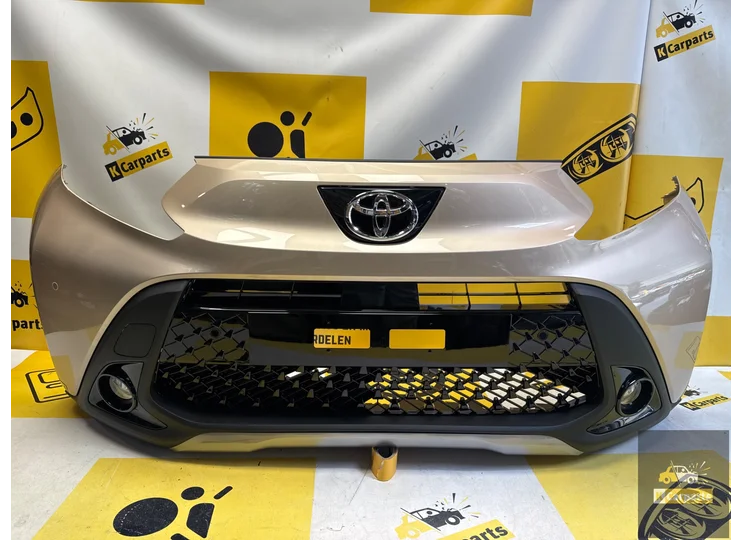 Toyota Aygo X Voorbumper origineel Compleet PDC 52119-OH19