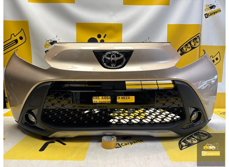 Toyota Aygo X Voorbumper origineel 52119-OH19 pdc compleet