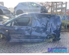 2012-vw-caddy-3-demontage-onderdelen-deur-blauw-stoelen — foto 4