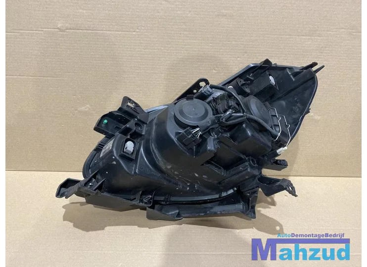 renault-clio-3-xenon-rechts-koplamp-rand-engels