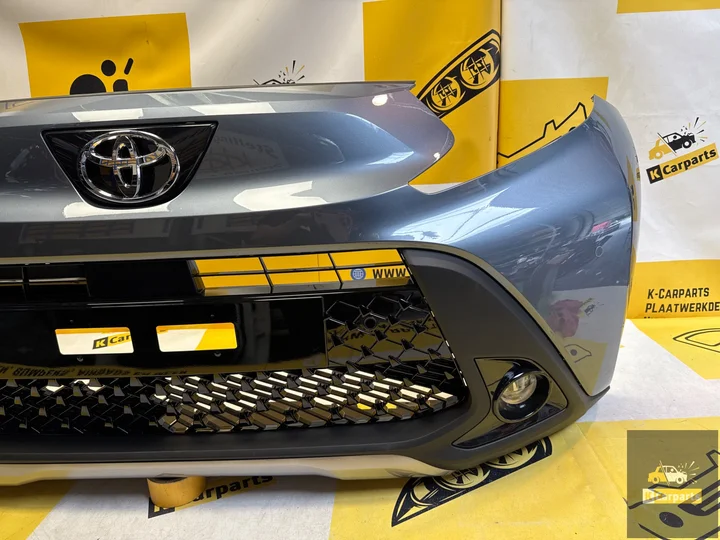 toyota-aygo-x-voorbumper-origineel-compleet-nieuw-pdc — foto 7
