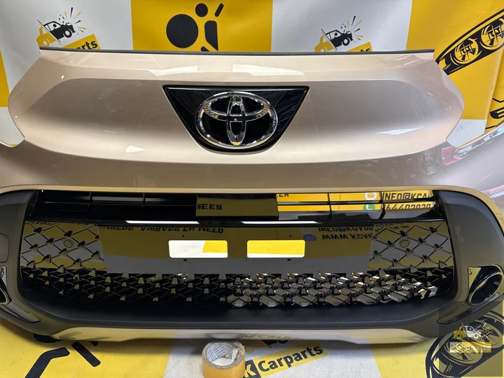 toyota-aygo-x-voorbumper-origineel-52119oh19-pdc-compleet — foto 2