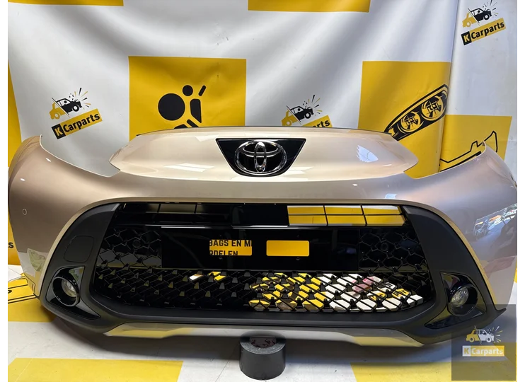 Toyota Aygo X Voorbumper origineel compleet 52119-OH19
