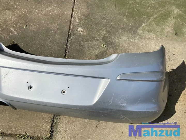 opel-corsa-d-zilver-grijs-achterbumper-3-deurs-20062014 — foto 2